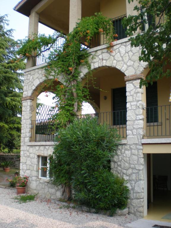 トッリ・デル・ベーナコ Residenza Le Loggeアパートホテル エクステリア 写真
